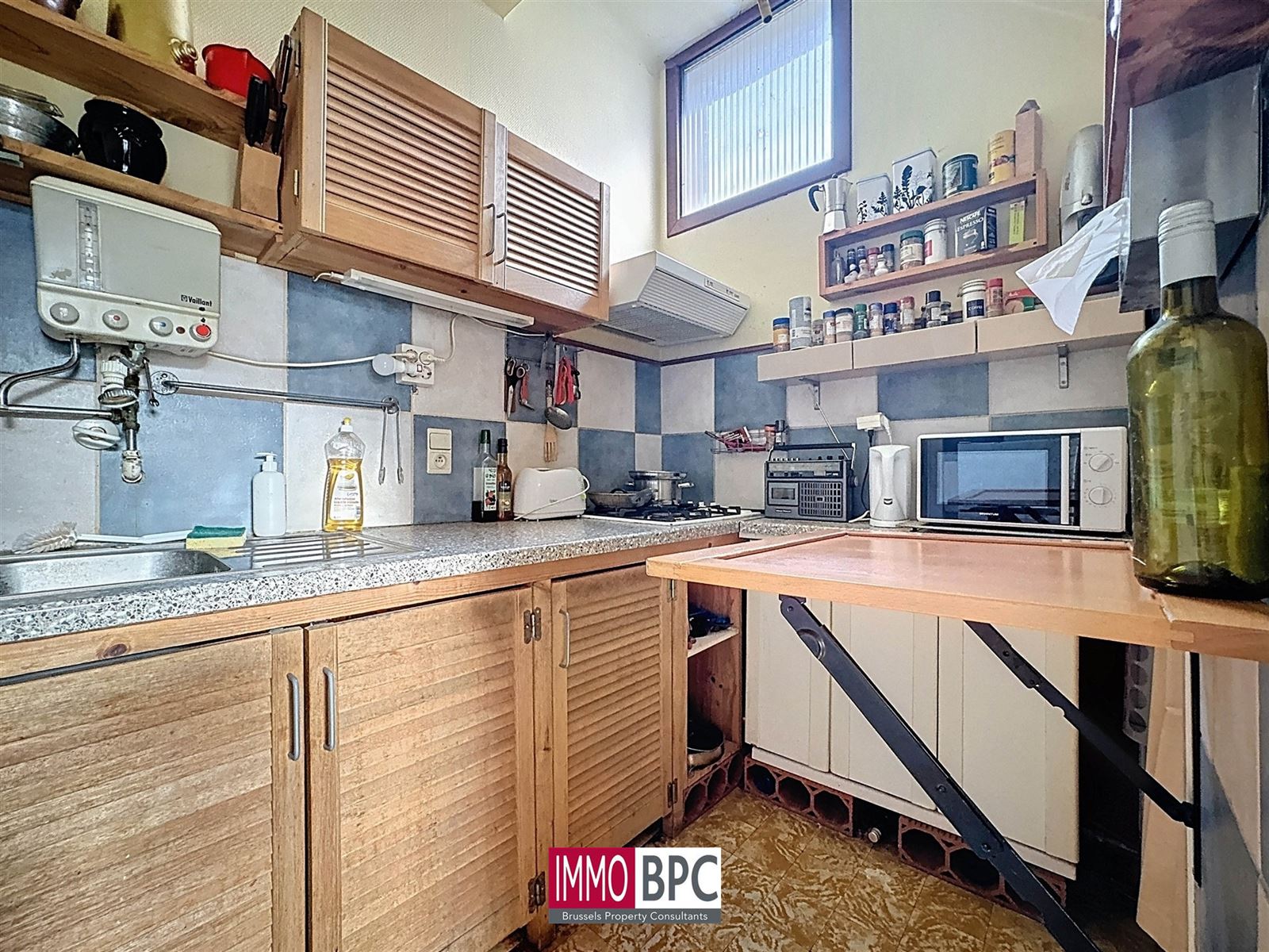 Kleine charmante achterwoning met tuin en dubbele garage te renoveren  foto 9