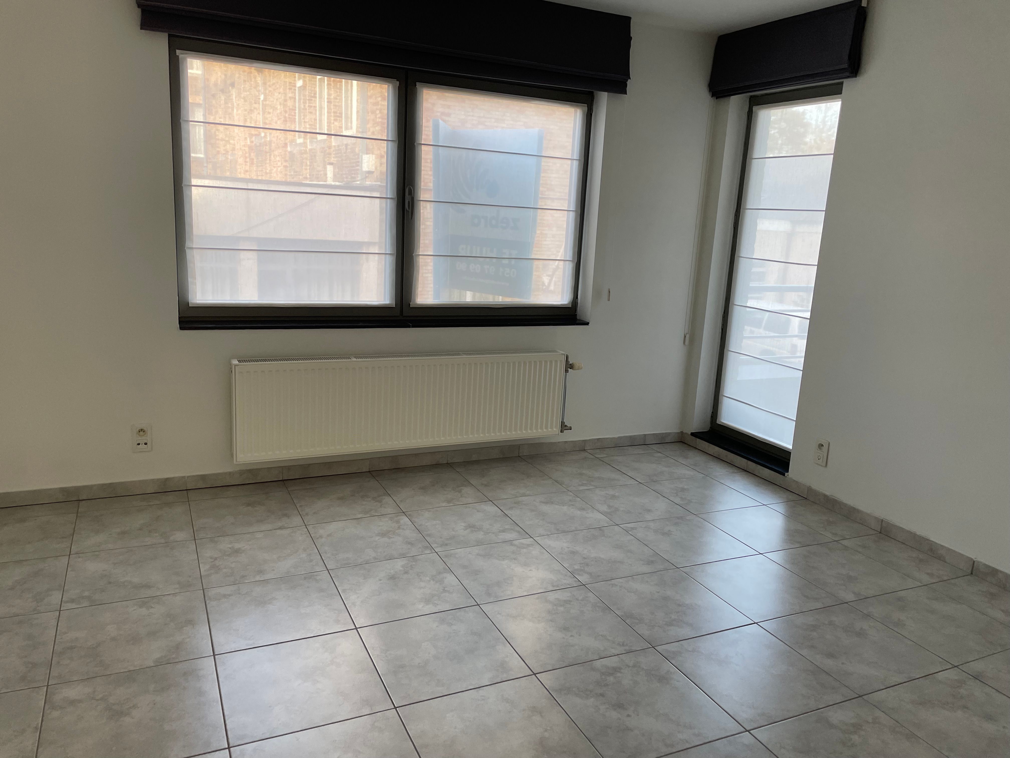 ruim instapklaar twee slaapkamer appartement met groot zongericht terras & gelijkvloerse garage foto 24