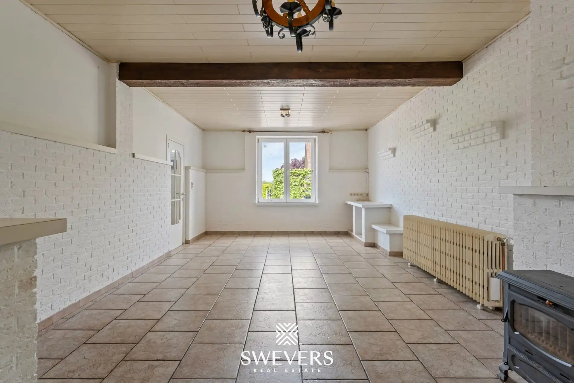 Charmante open bebouwing met 3 slaapkamers, zonnige tuin en renovatiepotentieel foto 2