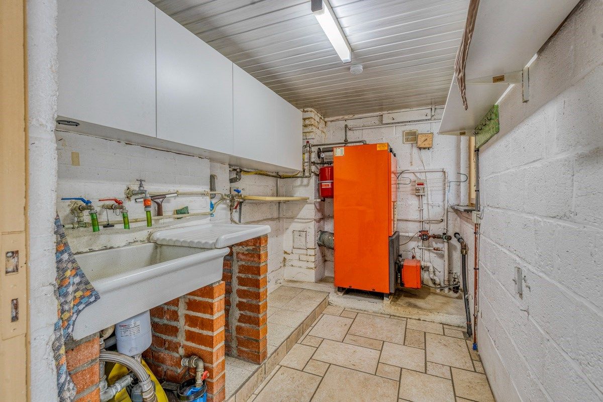 Ruime gezinswoning met mooie tuin in rustige wijk ! foto 21