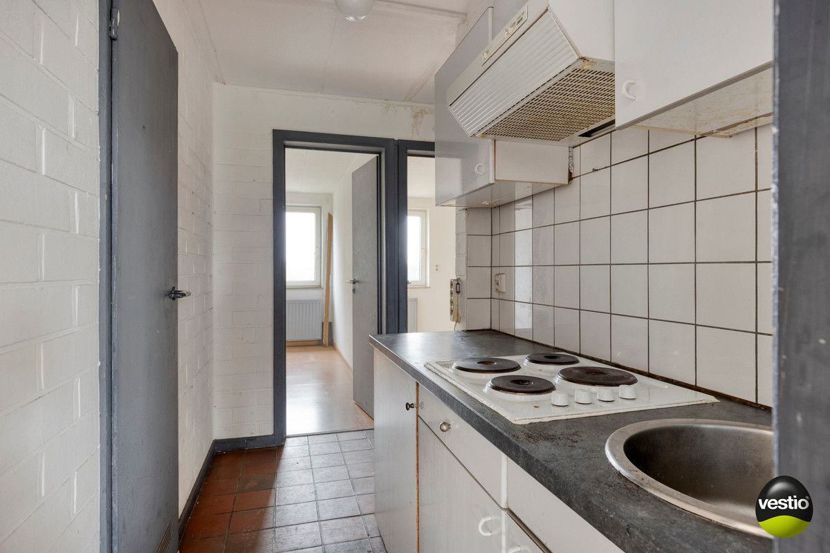 COMPLEX BESTAANDE UIT 14 TE RENOVEREN STUDIO'S MET UITBREIDINGSMOGELIJKHEDEN TE VELDWEZELT. foto 10