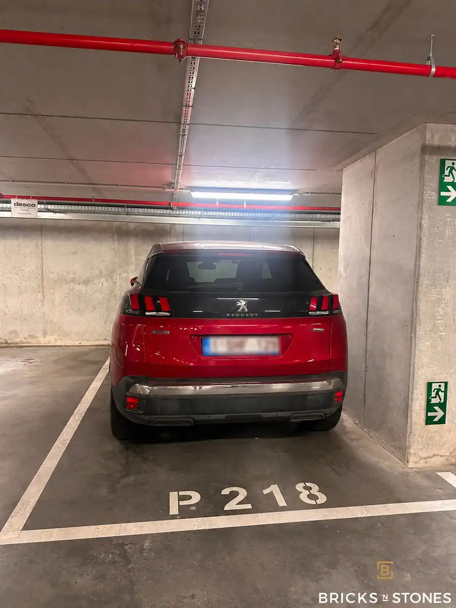 Autostaanplaats in nieuwbouwcomplex foto 2