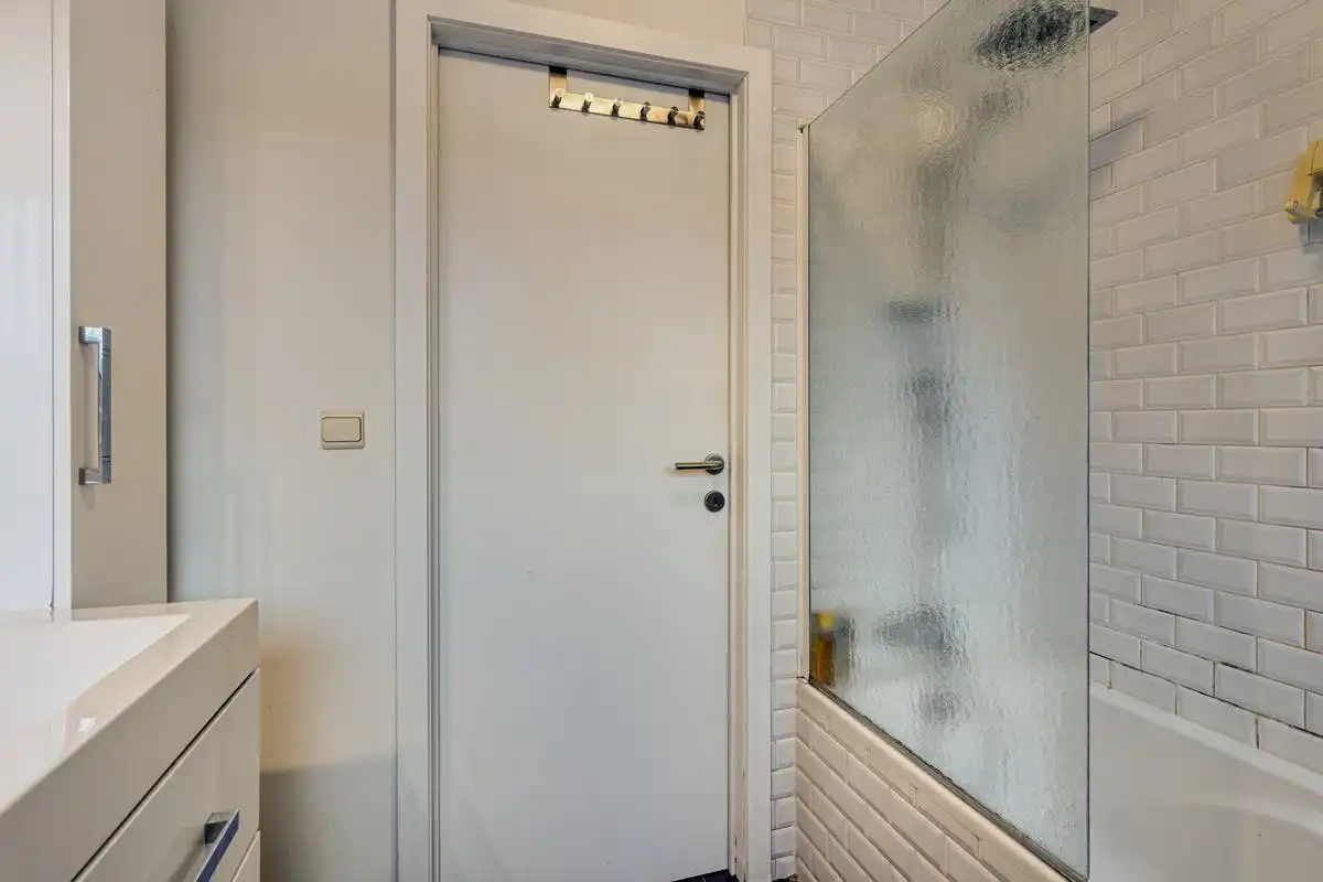 Gelijkvloers appartement met parking en tuintje te koop in Hasselt foto 10