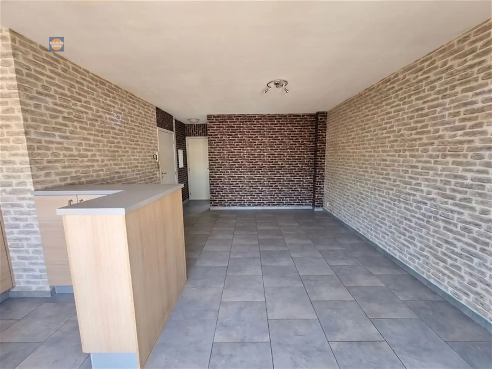 Instapklaar 1-slaapkamerappartement met kelderberging in centrum Willebroek foto 3