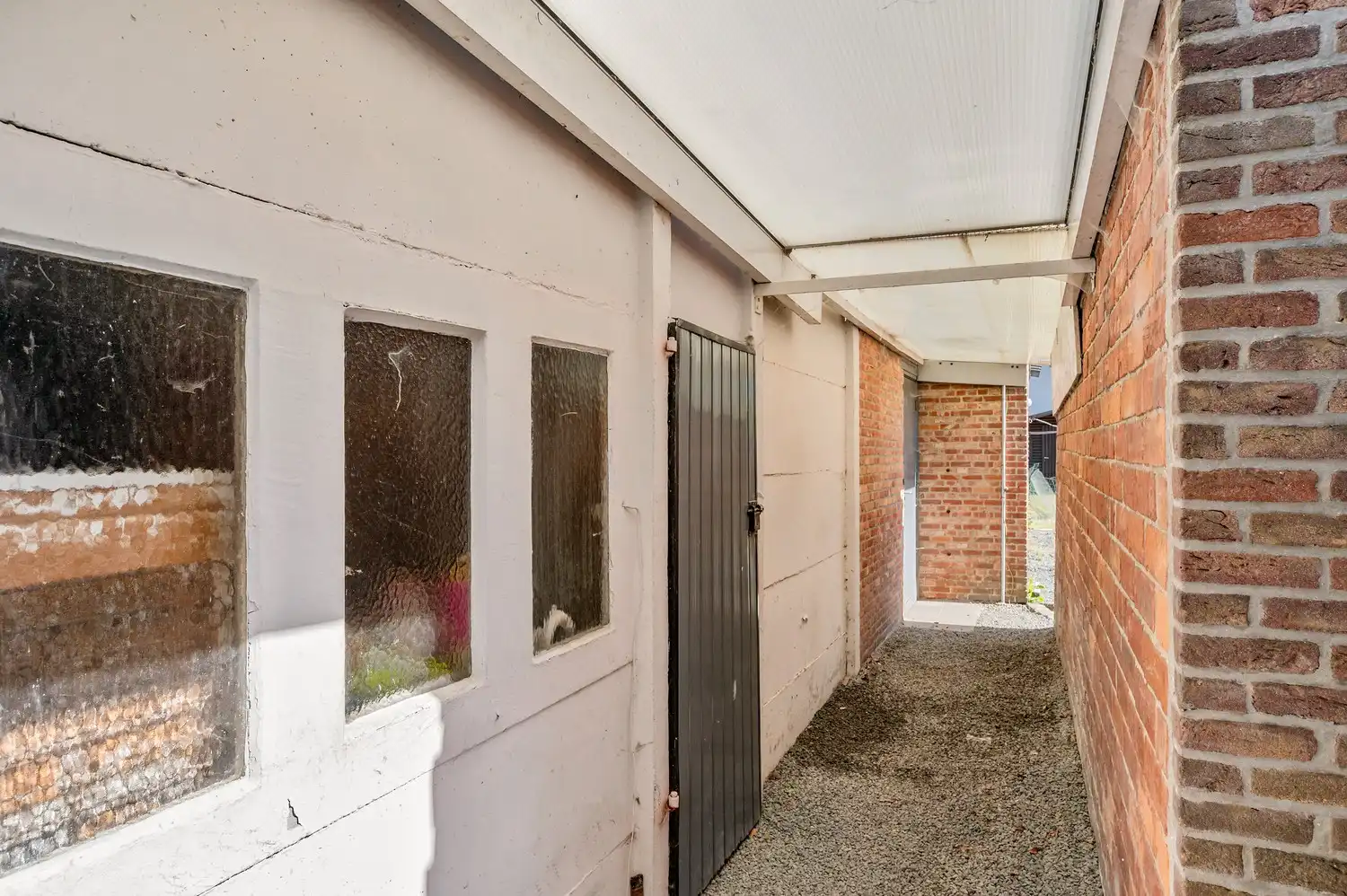 Te renoveren laagbouwwoning met garage, atelier en tuin op een perceel van 451 m². foto 25