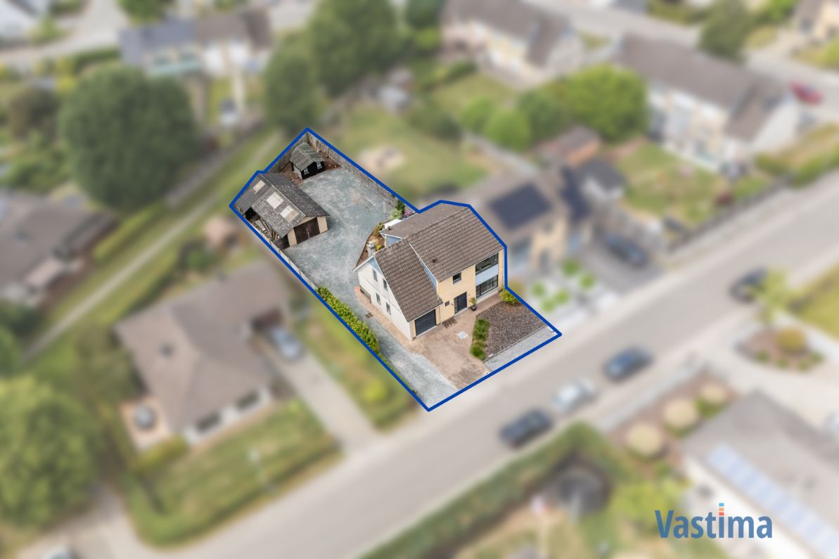 Halfopen gezinswoning met 3-4 slaapkamers en extra garage foto 3