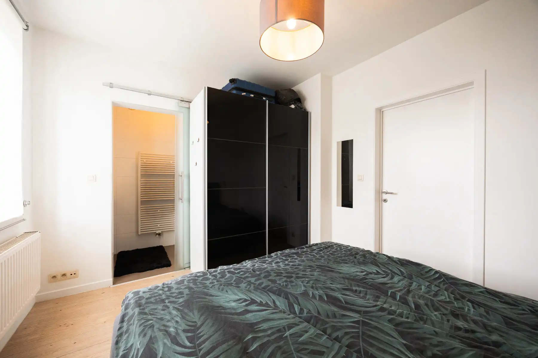 Instapklaar gelijkvloers appartement met tuin en carport foto 11