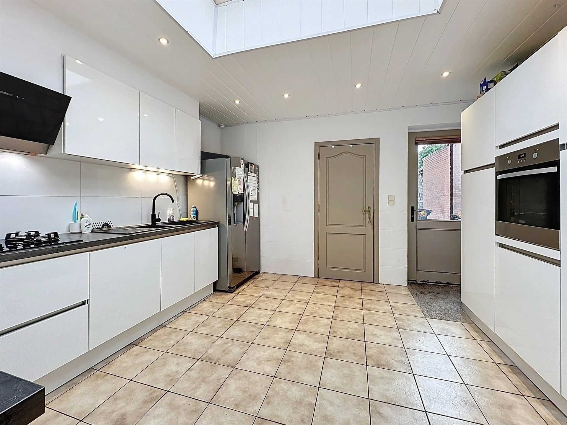 Instapklare woning met 3 slaapkamers en gezellige tuin op perceel van 310m². foto 8
