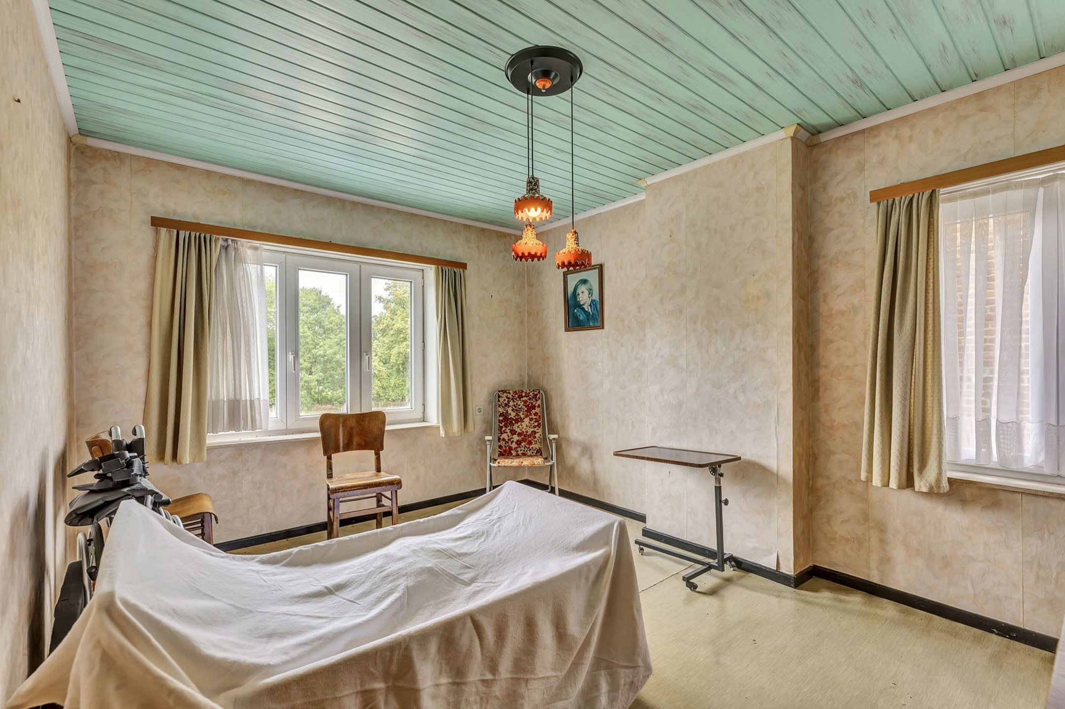 Te renoveren woning met garage en tuin foto 13