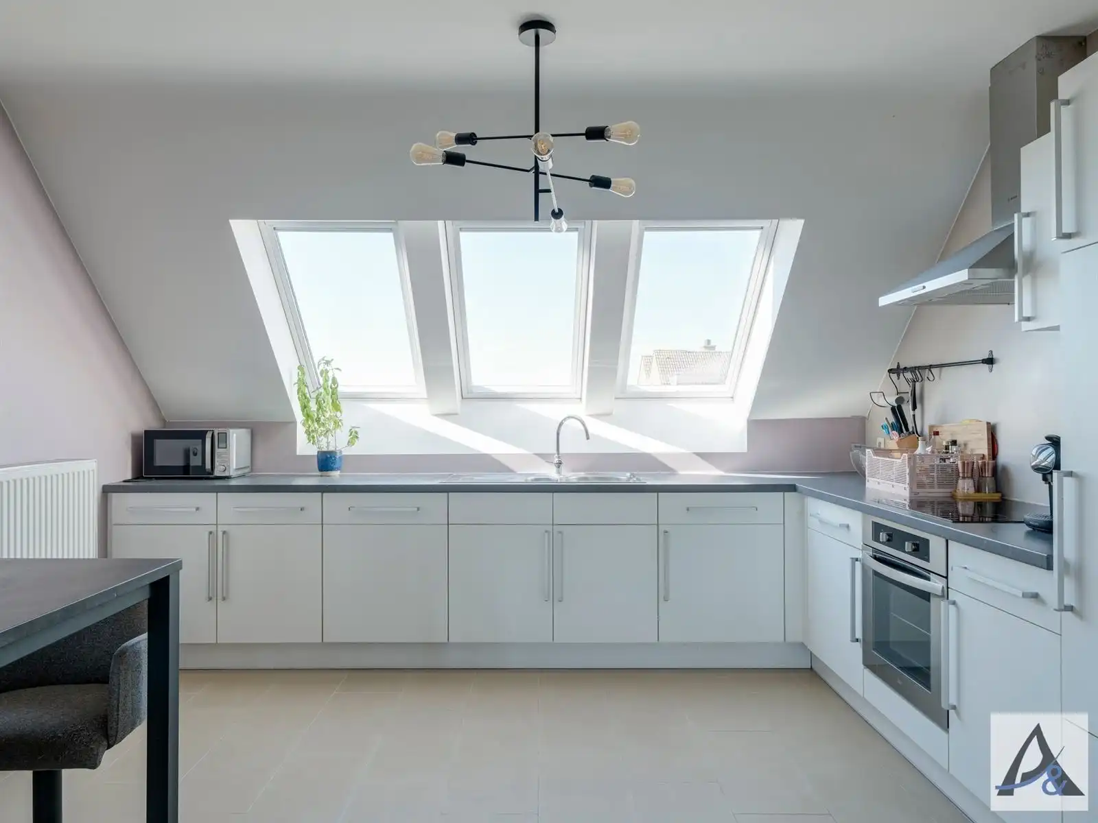 Ruim duplex appartement met terras en 3 slaapkamers in Diepenbeek. foto 9