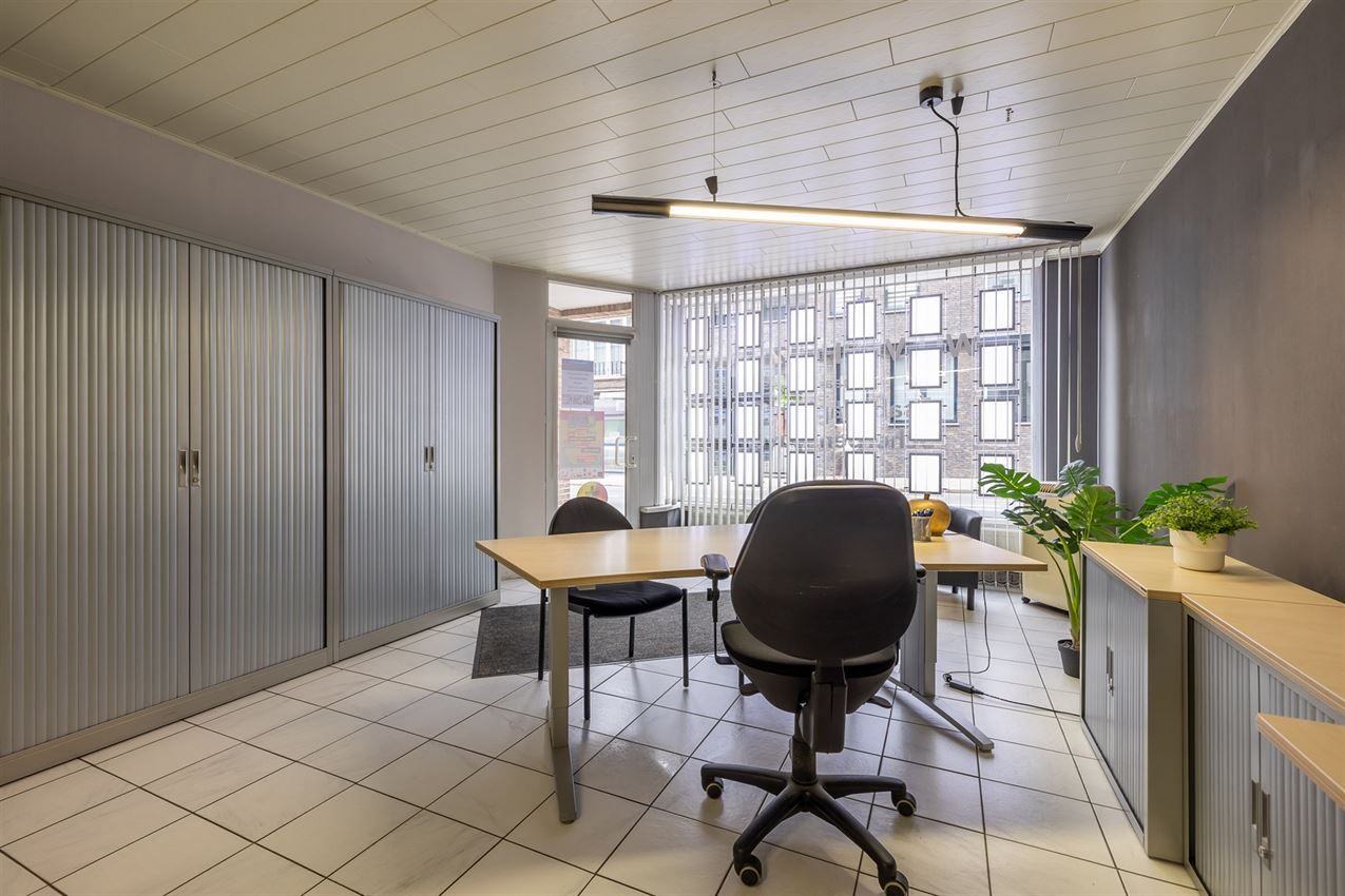 Verzorgd gebouw met handelszaak en 2 apt foto 43