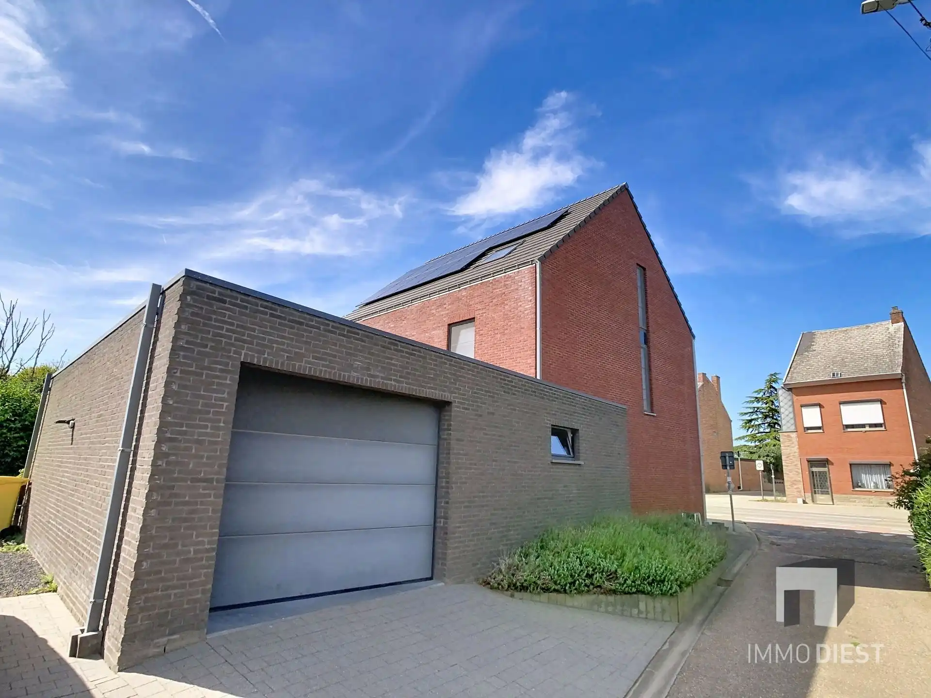 Moderne, lichtrijke woning met aangename tuin aan de voet van hartje Scherpenheuvel. foto 33
