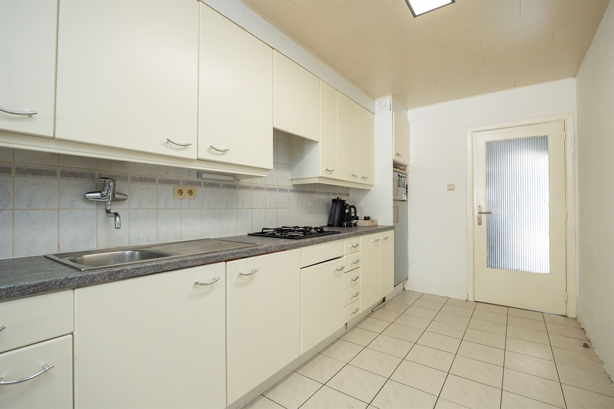 Gelijkvloersappartement met stadskoer en garagebox foto 10