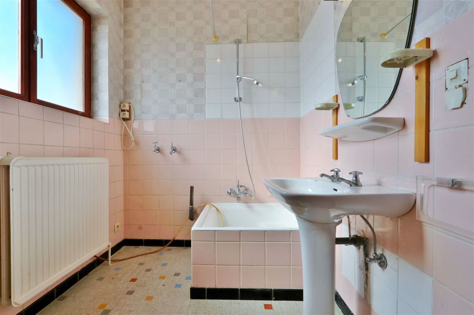 Opbrengstwoning met 2 appartementen en 3 garageboxen foto 17