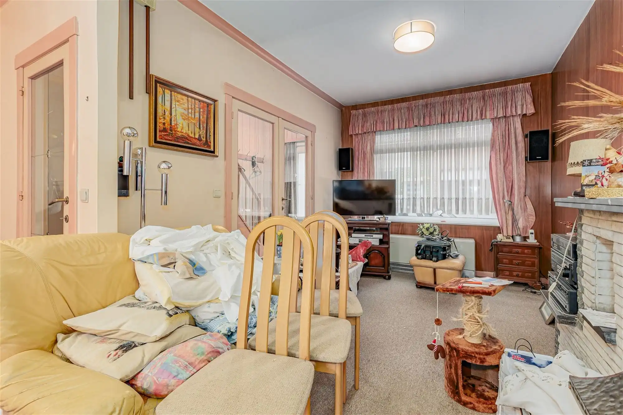 Te renoveren woning met tuin in Merksem foto 4