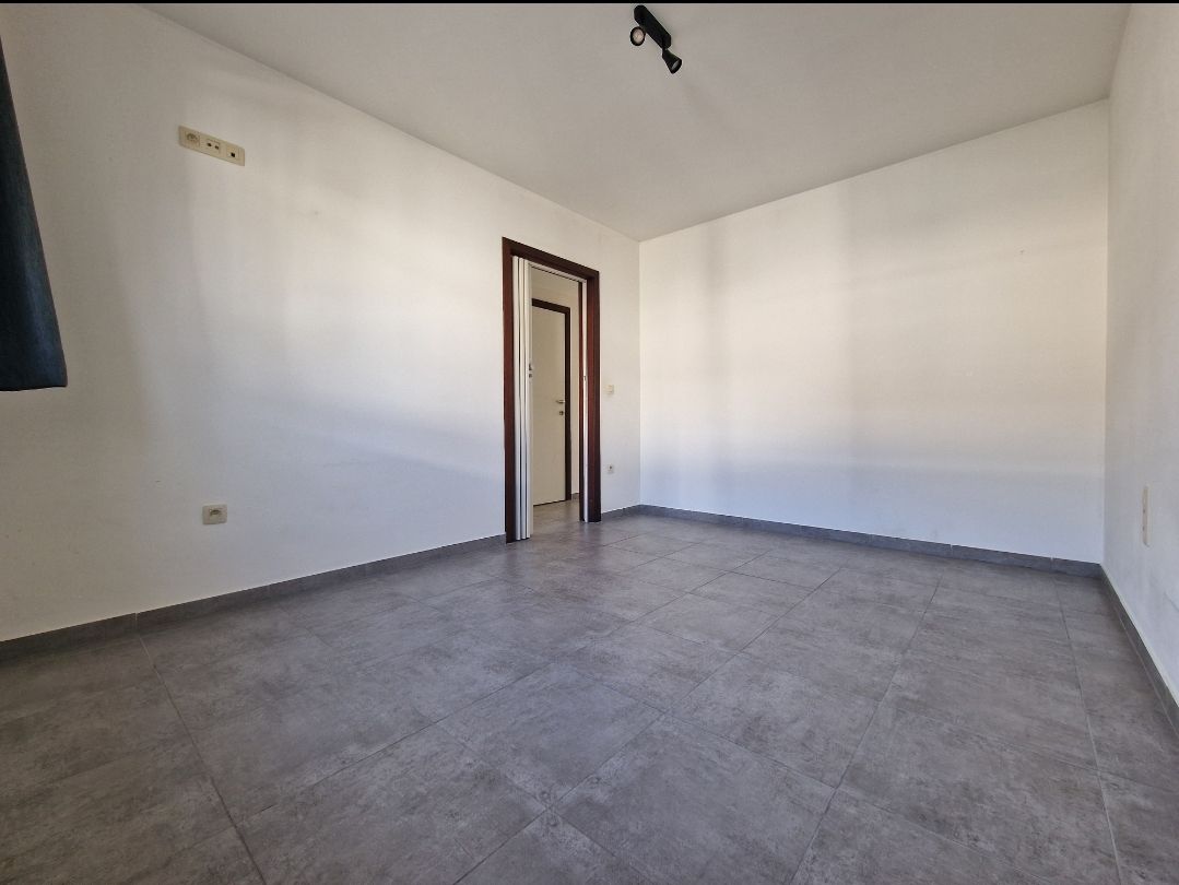 Energiezuinig appartement (2slpk) met terras en garageplaats in centrum foto 8