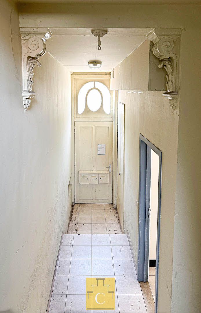 vergunde meergezinswoning nabij de Ezelpoort foto 4