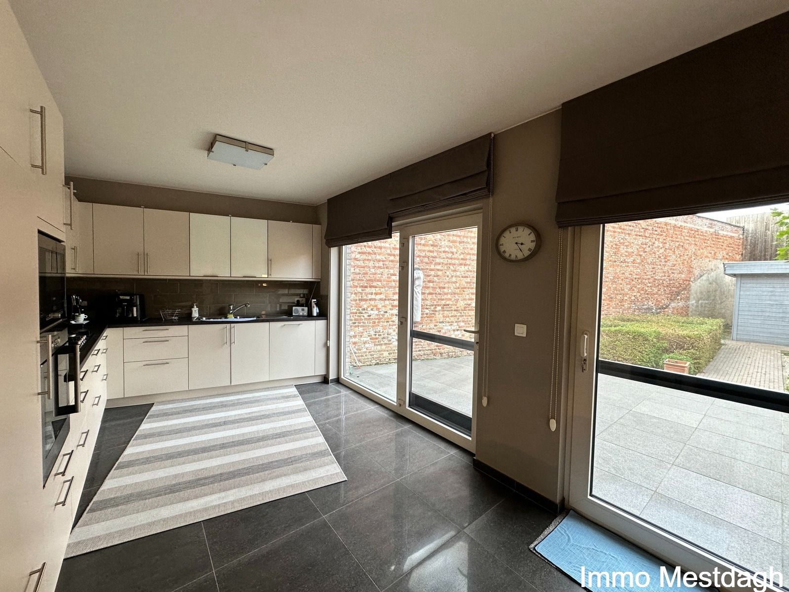 Ruim gelijkvloers appartement met tuin en autostaanplaats. foto 12