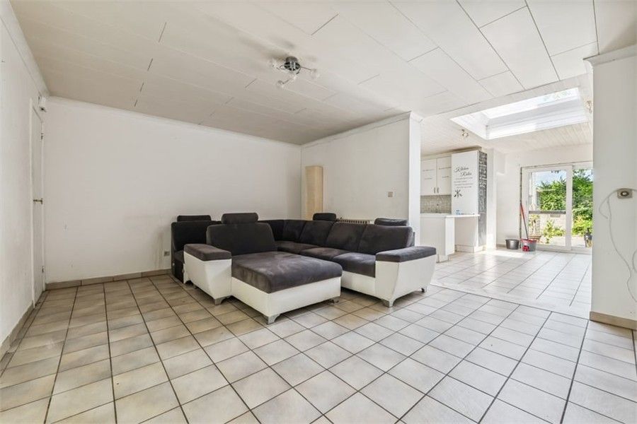 KNUSSE GEZINSWONING MET GEZELLIGE STADSTUIN IN HASSELT foto 8