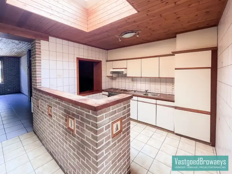 Te renoveren woning met zonrijke tuin nabij het station foto 6