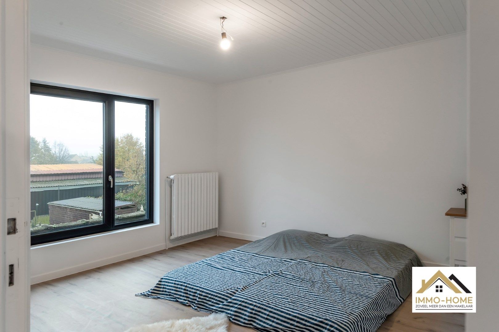 Zeer ruime woning met prachtig open zicht op agrarisch gebied foto 12