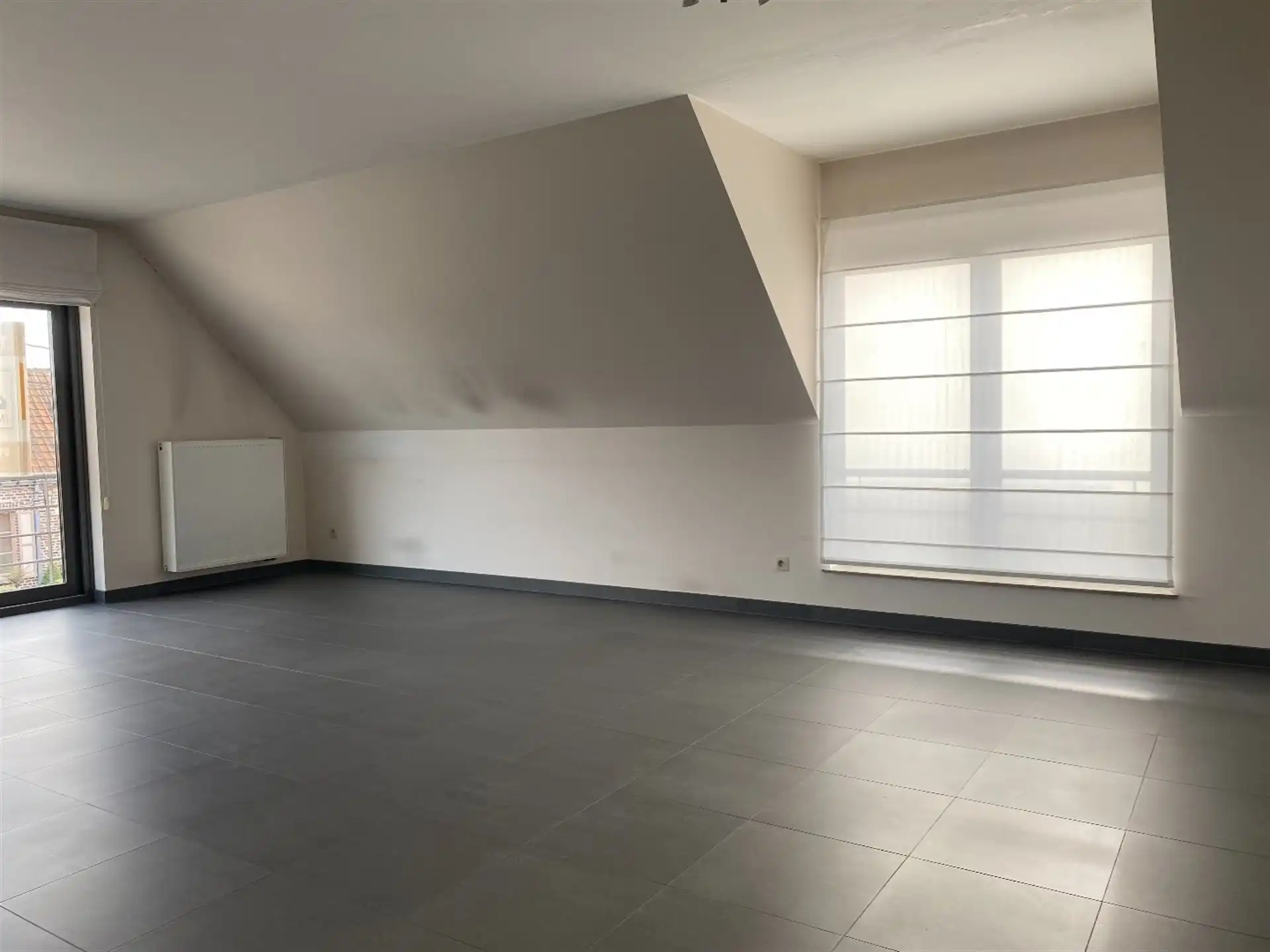 Gunstig gelegen dakappartement met autostaanplaats foto 4
