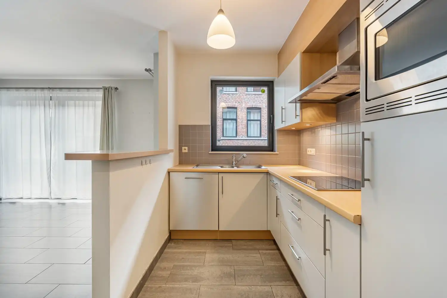 Centraal gelegen en energiezuinig(B-label) appartement met 2 slaapkamers, een terras en een kelder nabij het UZ Gasthuisberg te Leuven! foto 9