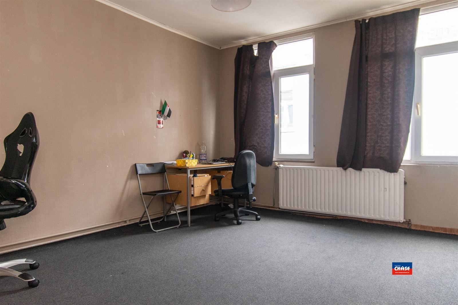 Ruime woning met 6 slaapkamers en handelsgelijkvloers foto 8