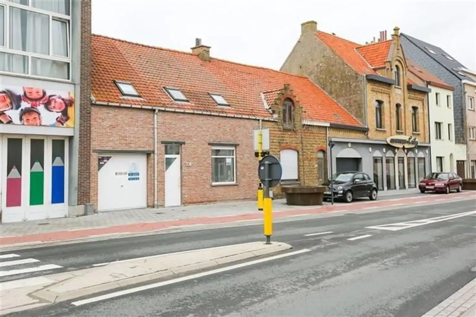 Te koop: te renoveren rijwoning op toplocatie foto {{pictureIndex}}