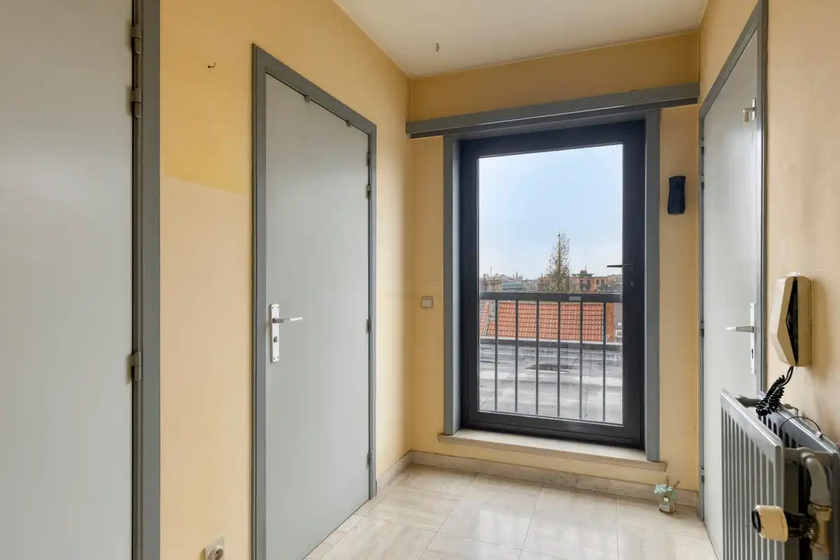 Dakappartement met groot zonnig terras en één slaapkamer centrum Ledeberg foto 3