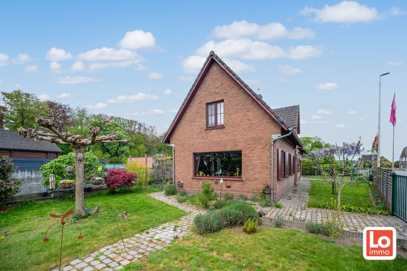 Degelijke alleenstaande woning met inpandige garage gelegen op een strategische locatie vlakbij Beervelde Dorp en het Park van Beervelde! foto 15