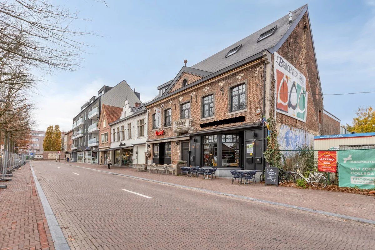 Zeer ruim handelspand met tuin en exclusief triplex  appartement met privé-lift en 2 slaapkamers, garage en staanplaats. foto 39