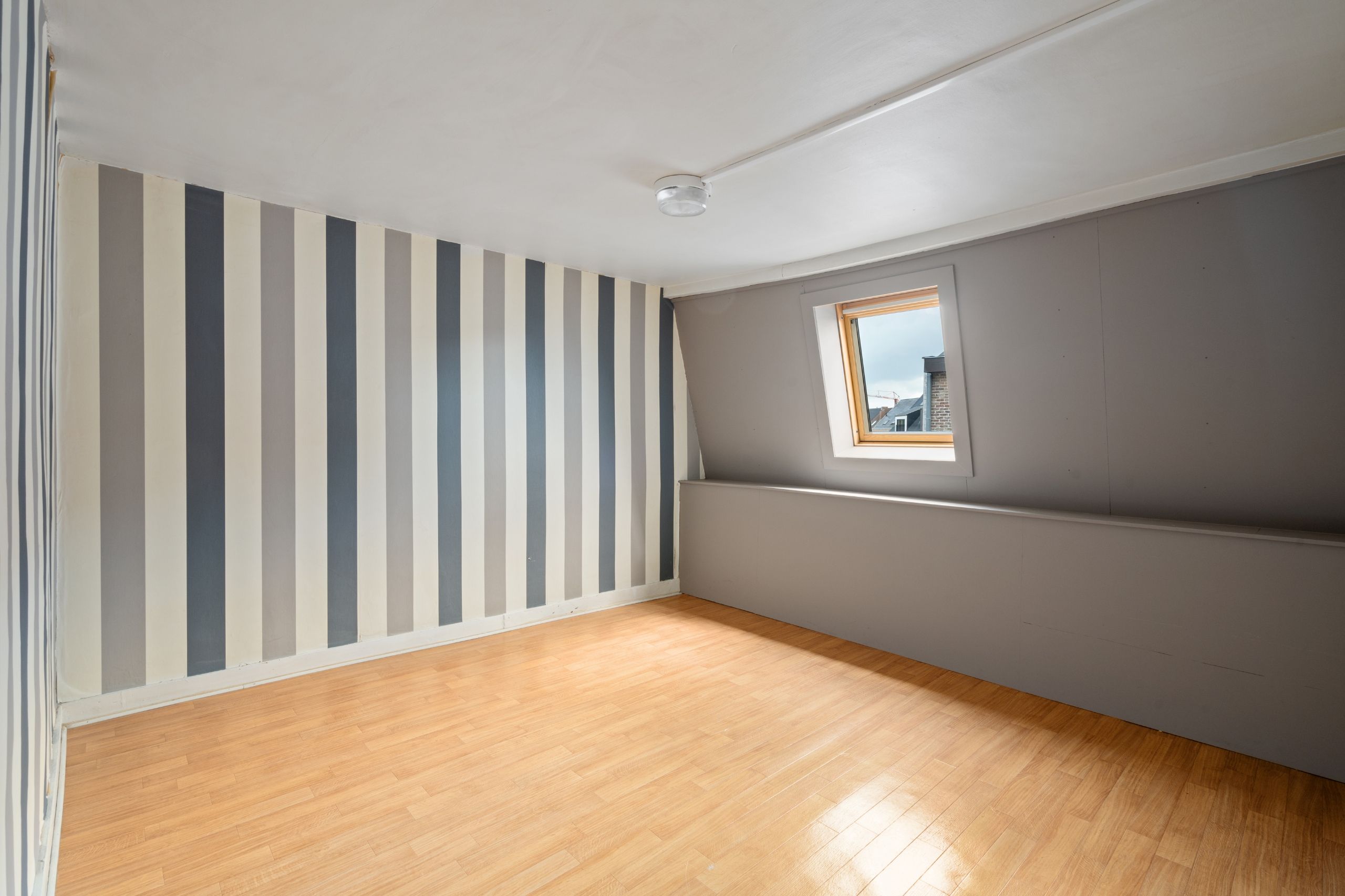 Te renoveren rijwoning in centrum Harelbeke foto 11
