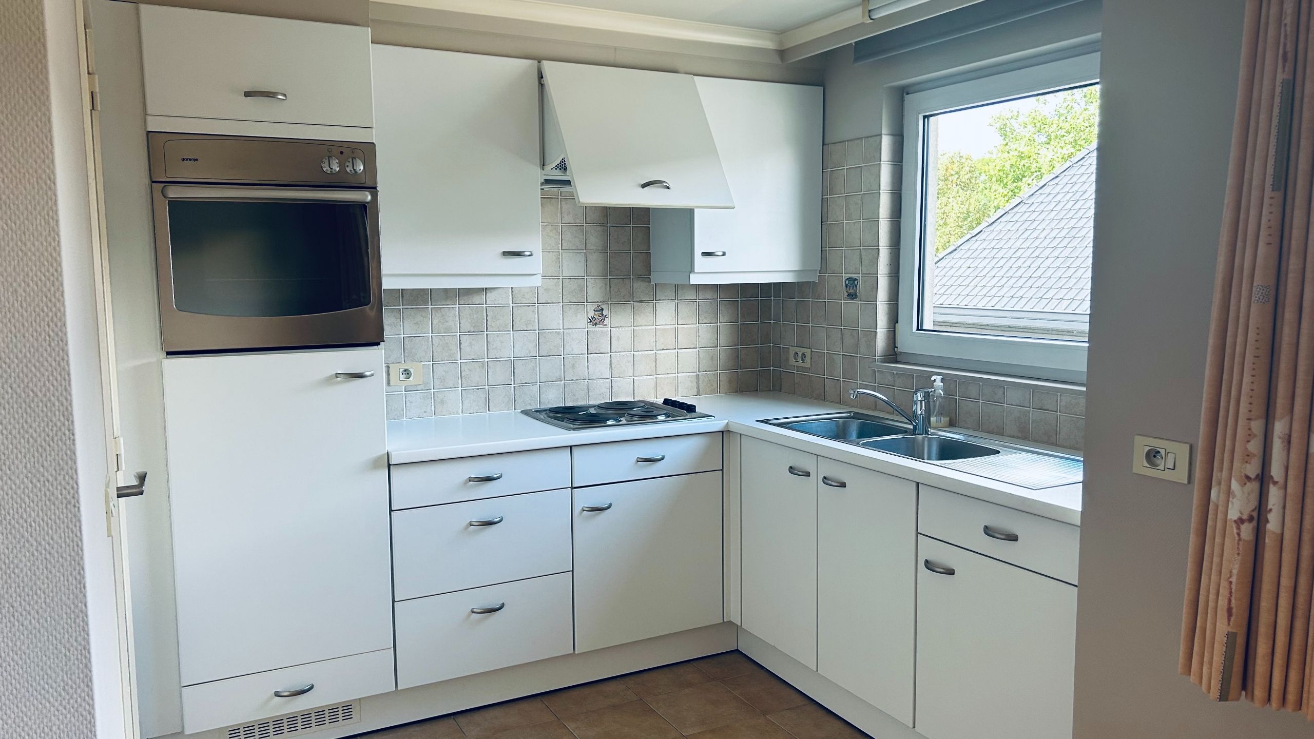 Verzorgd appartement in Deerlijk-centrum met 2 slpks., terras, autostaanplaats & kelderberging foto 5