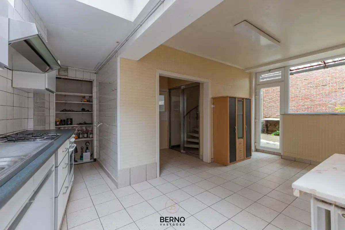 Woning met polyvalente benedenruimte foto 17