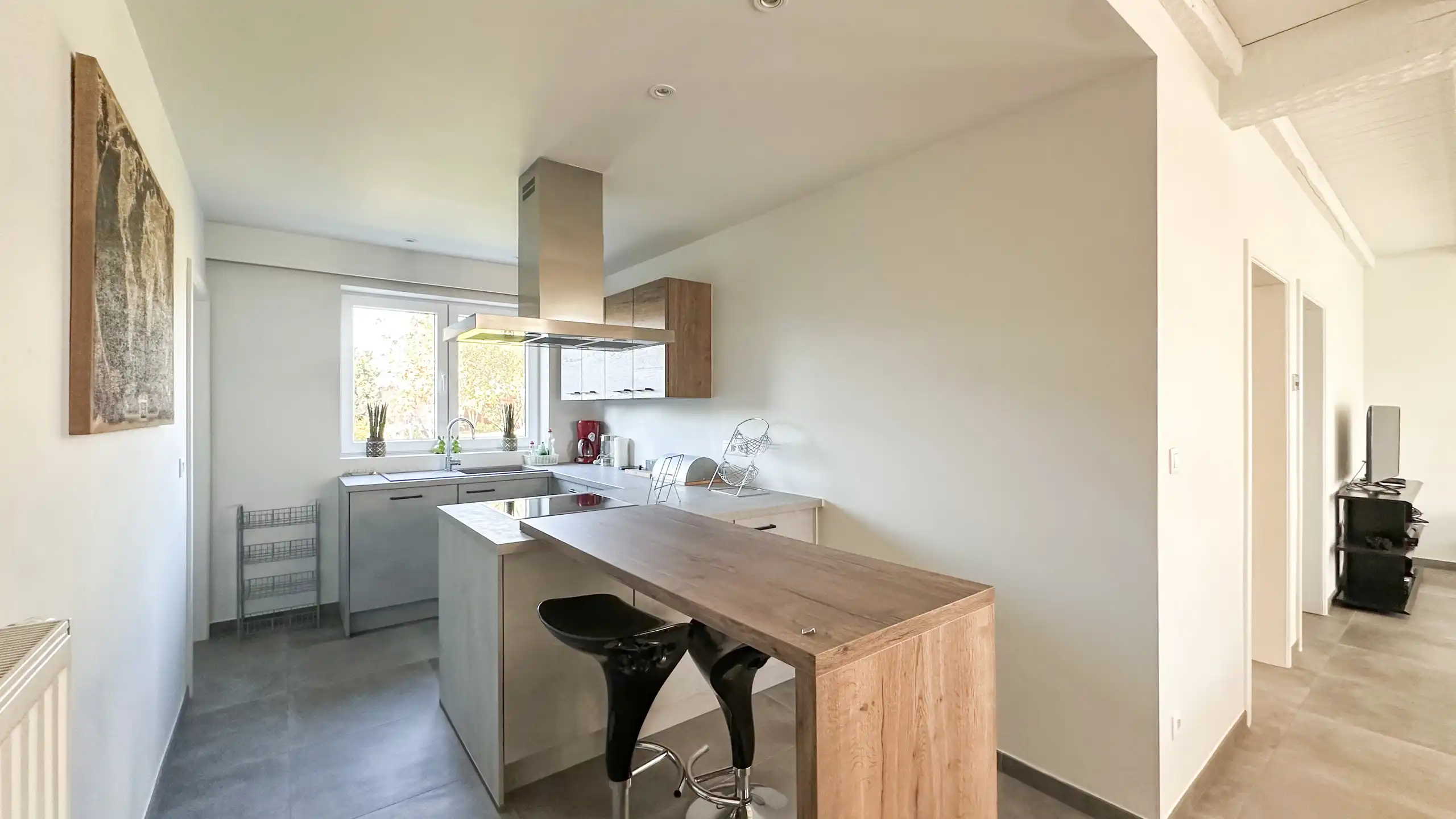 Charmante woning met 2 slaapkamers en een polyvalente ruimte foto 10