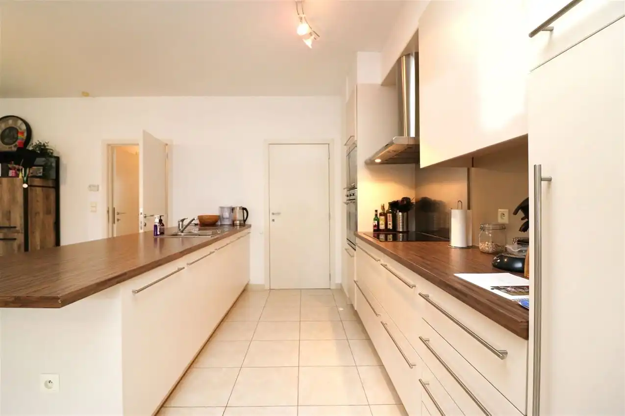 Ruim gelijkvloers wonen met tuin én rendement. foto 14