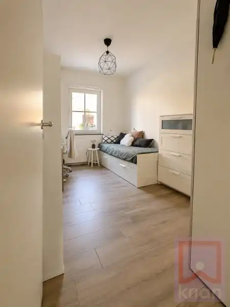 Volledig instapklaar gelijkvloers appartement met 2 slaapkamers, ruime tuin én garagebox foto 13