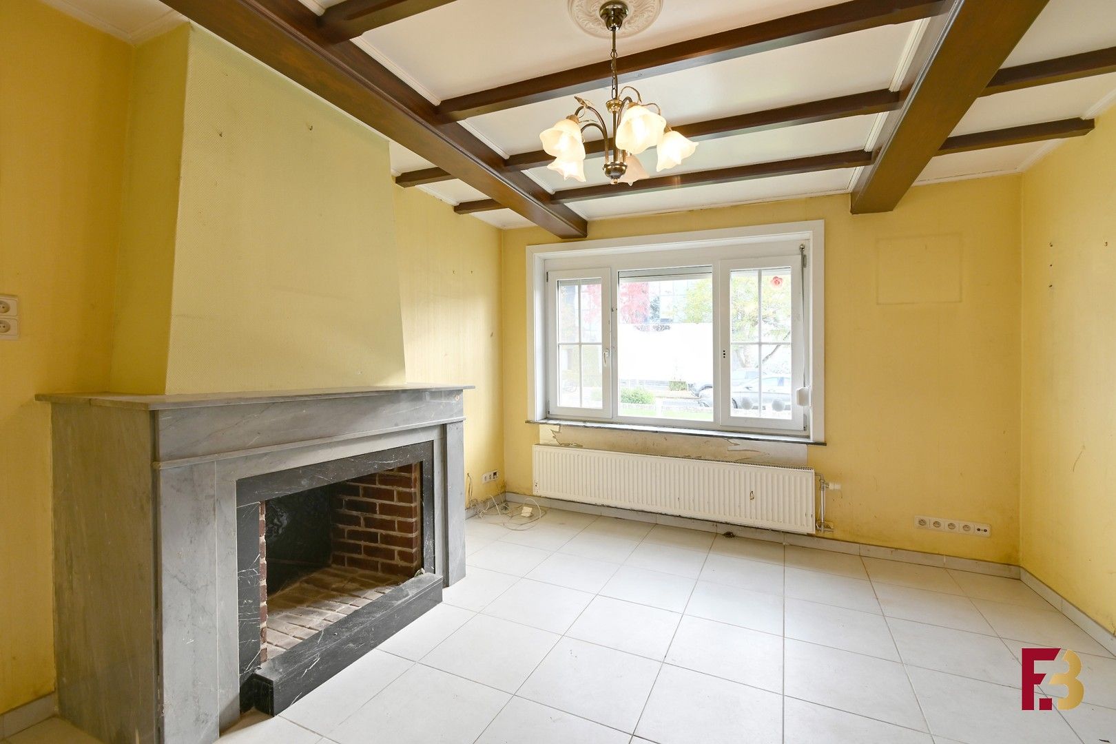 Woning met potentieel, garage en oprit in Zwijnaarde (geen renovatieplicht!) foto 4