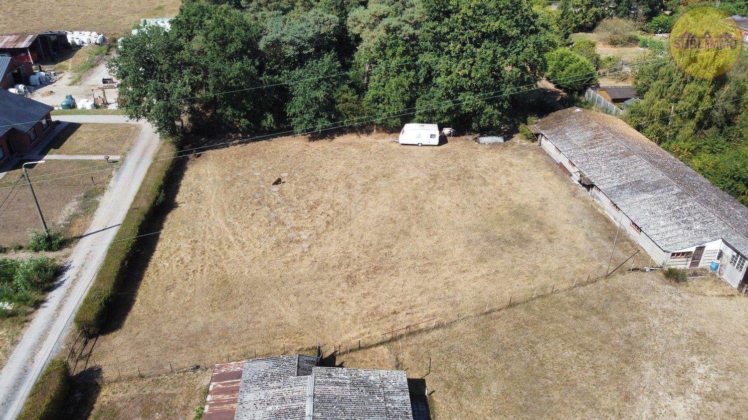Te renoveren bebouwing op een royaal perceel van 4.119 m² te Mol met tal van mogelijkheden. foto 3