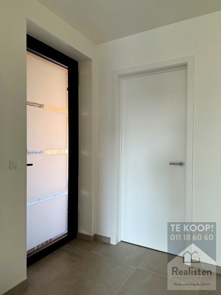 Schakelwoning in hartje Godsheide foto 6