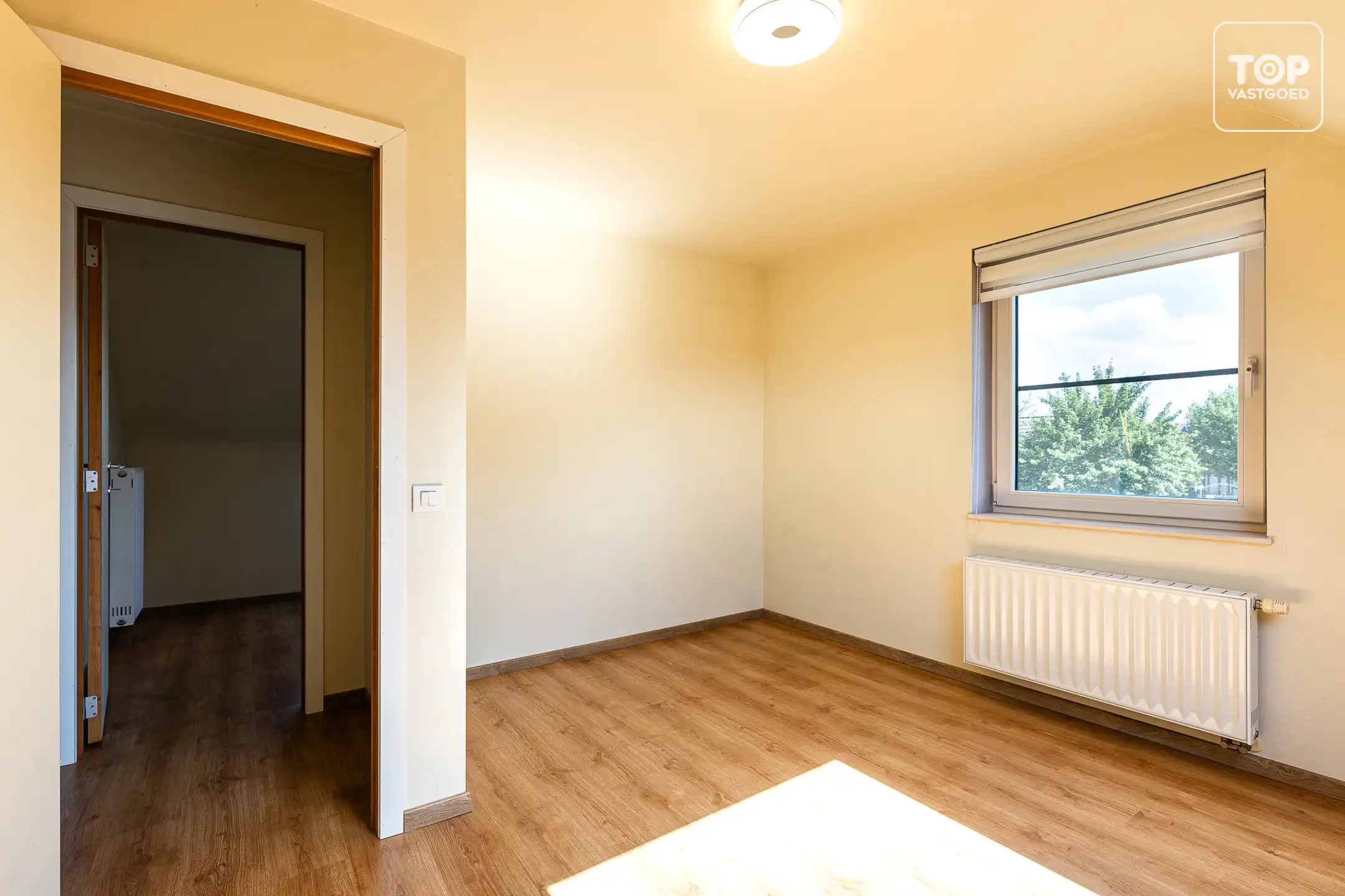 Rustig gelegen en energiezuinige woning met zonnige tuin foto 13