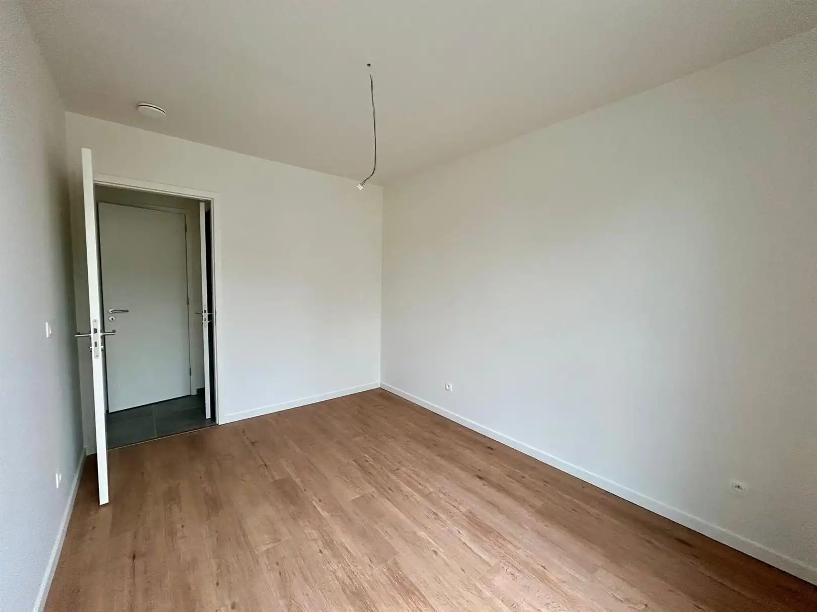 Nieuwbouwappartement met 1 slaapkamer en parkeerplaats foto 8