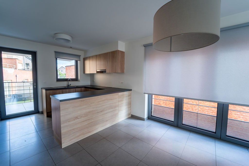 GUNSTIG GELEGEN 2 SLAAPKAMER APPARTEMENT 94 M² MET ONDERGRONDSE AUTOSTANDPLAATS EN KELDERBERGING IN HET CENTRUM VAN ZOLDER foto 6