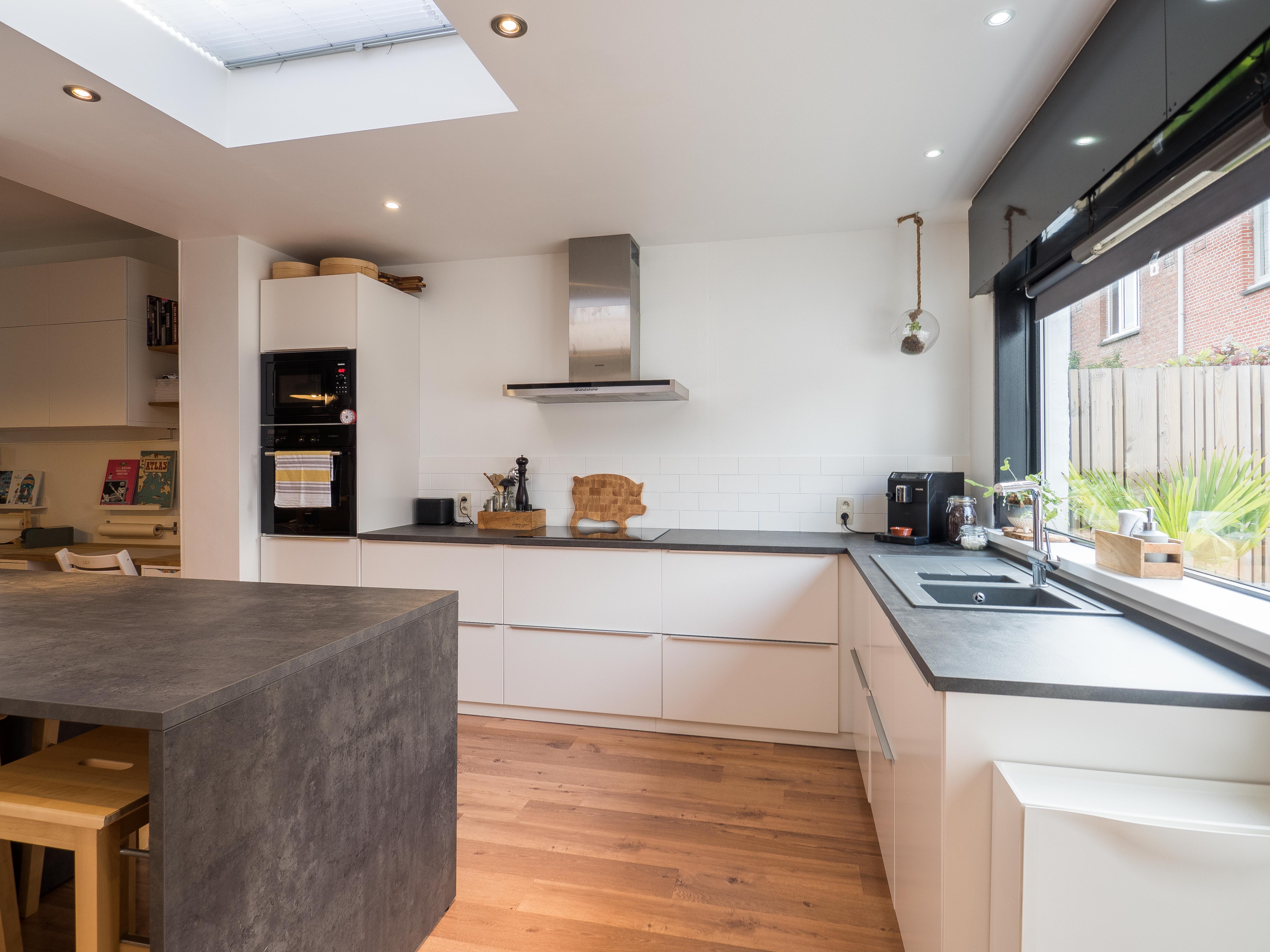 Sfeervolle gezinswoning met zonnige tuin in Mortsel foto 8