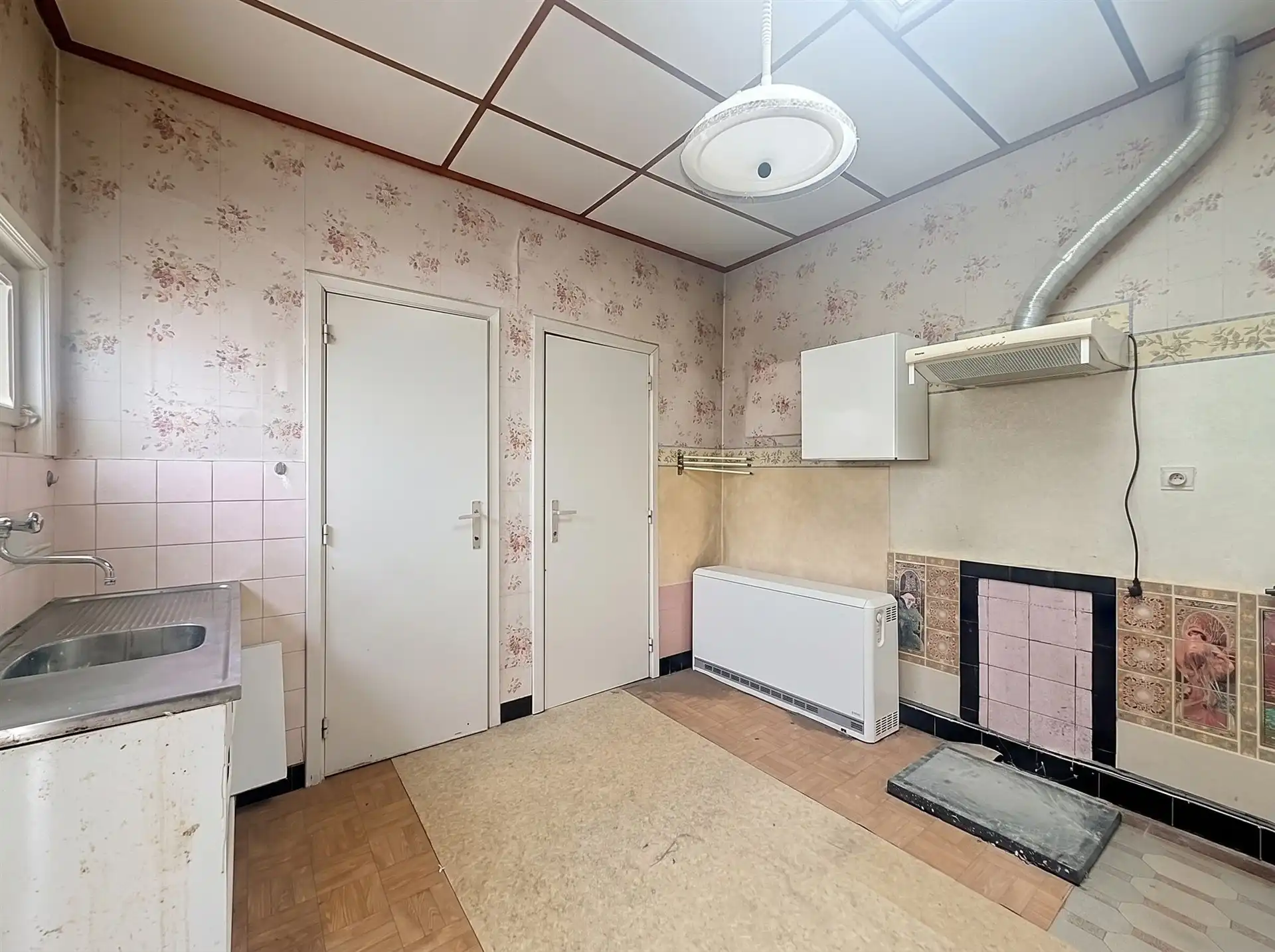 Ruime woning met veel potentieel, garage en tuin in het centrum van Beveren! foto 11