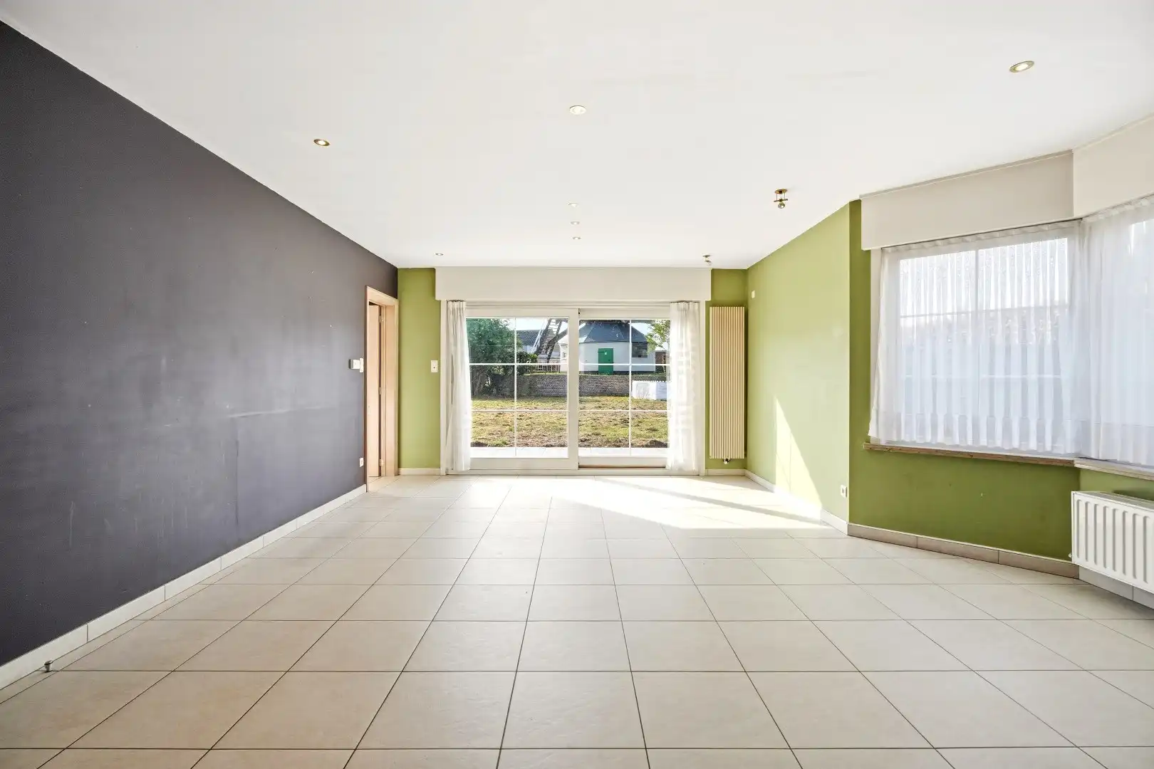 Ruime halfopen woning met 5 slaapkamers te koop in Werken met garage en ruime tuin! foto 6