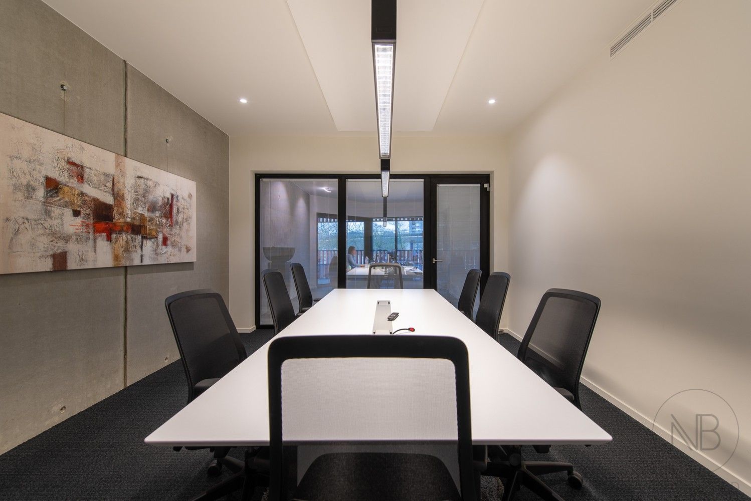 Volledig ingerichte en verhuurde kantoorverdieping in het zakelijke centrum van Genk (Botta-gebouw) foto 14