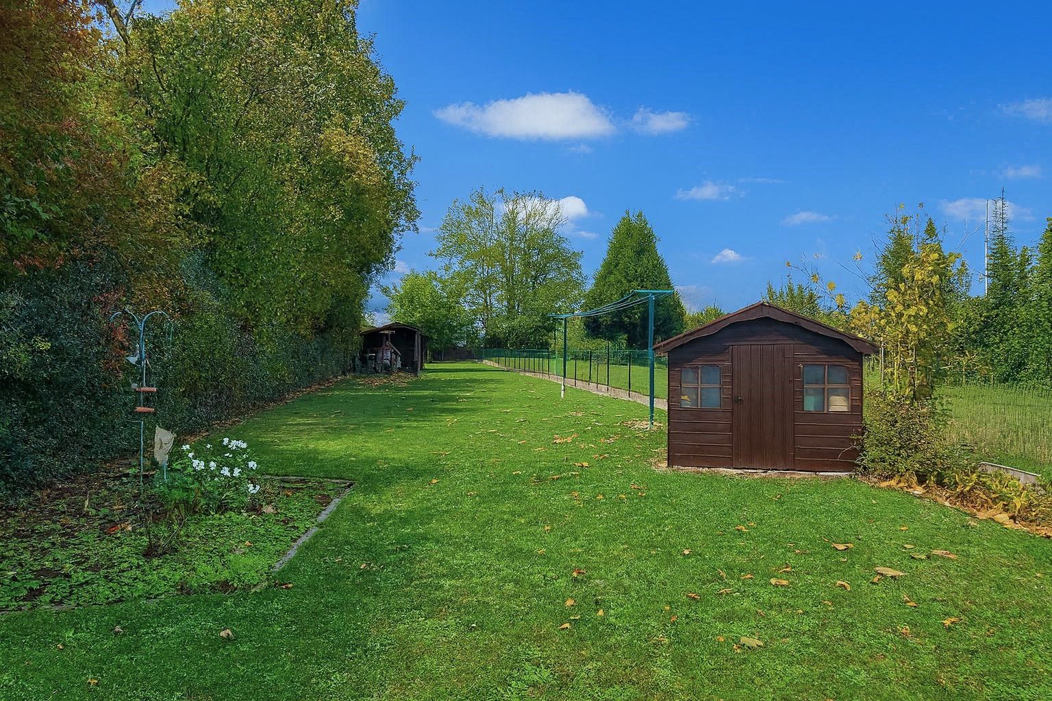 Charmante instapklare woning op 976m² met 3 slaapkamers, leefveranda en mooie grote tuin!  foto 26