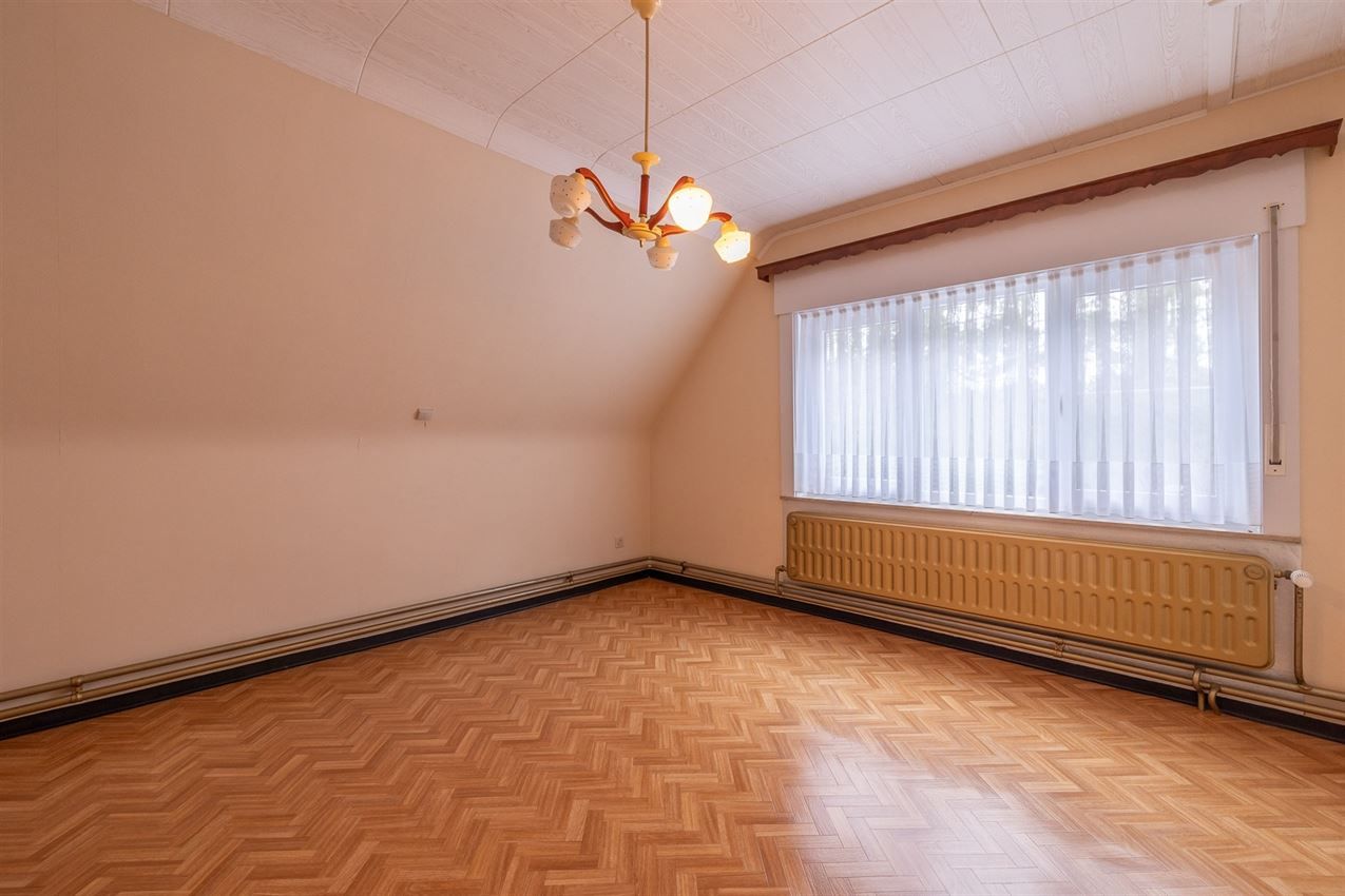 Temidden van agrarisch gebied, grenzend aan bos foto 48